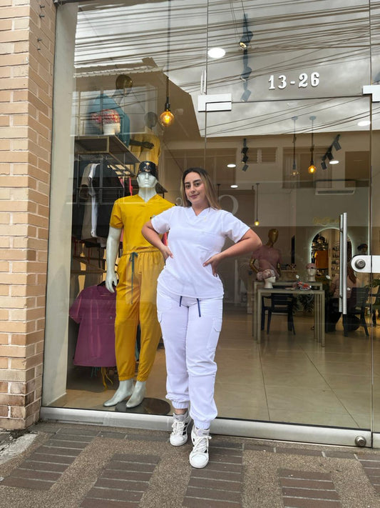 UNIFORME JOGGER BLANCO COMBINACIONES AZULES
