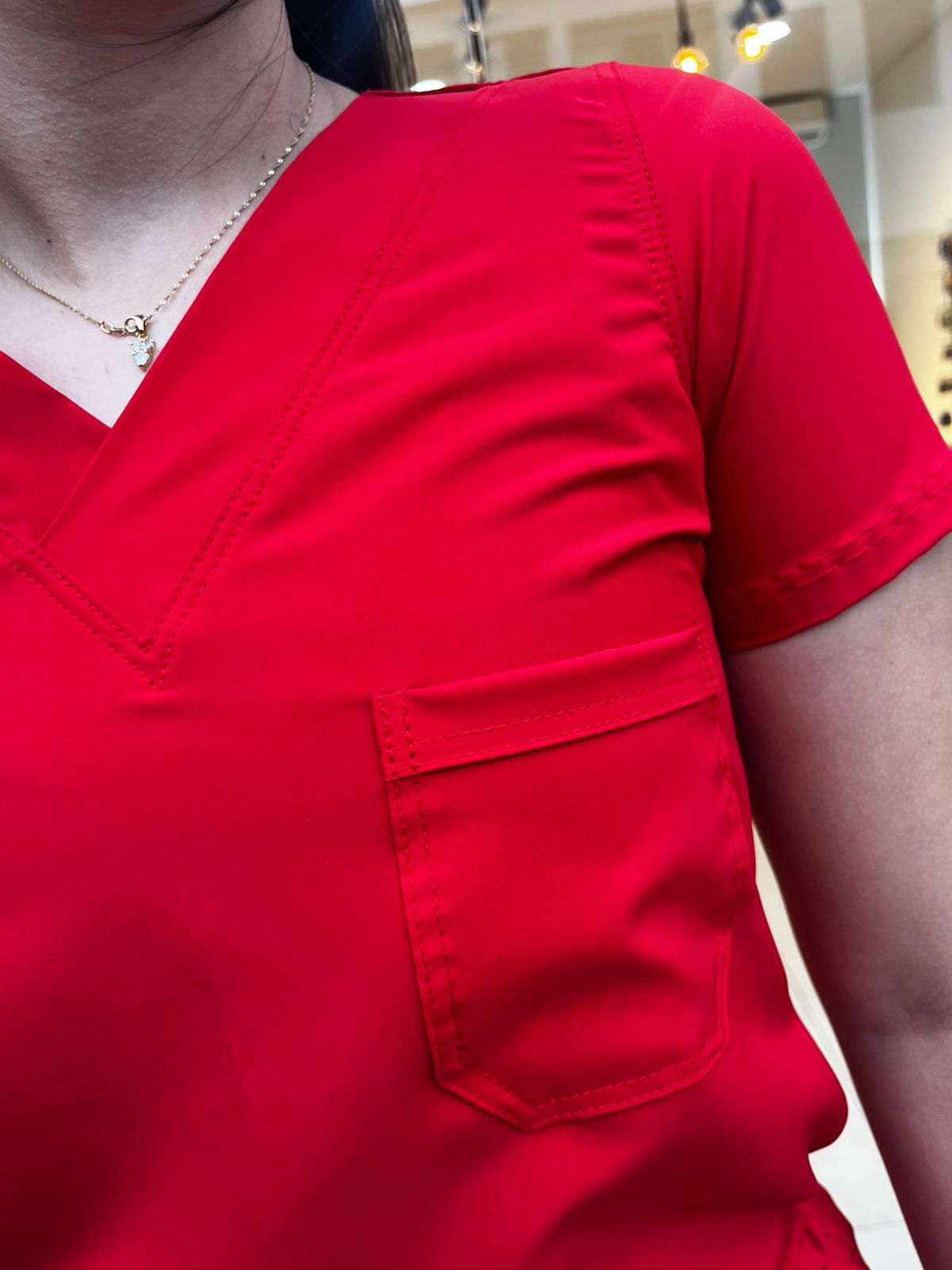 UNIFORME ROJO ABERTURA BOTA